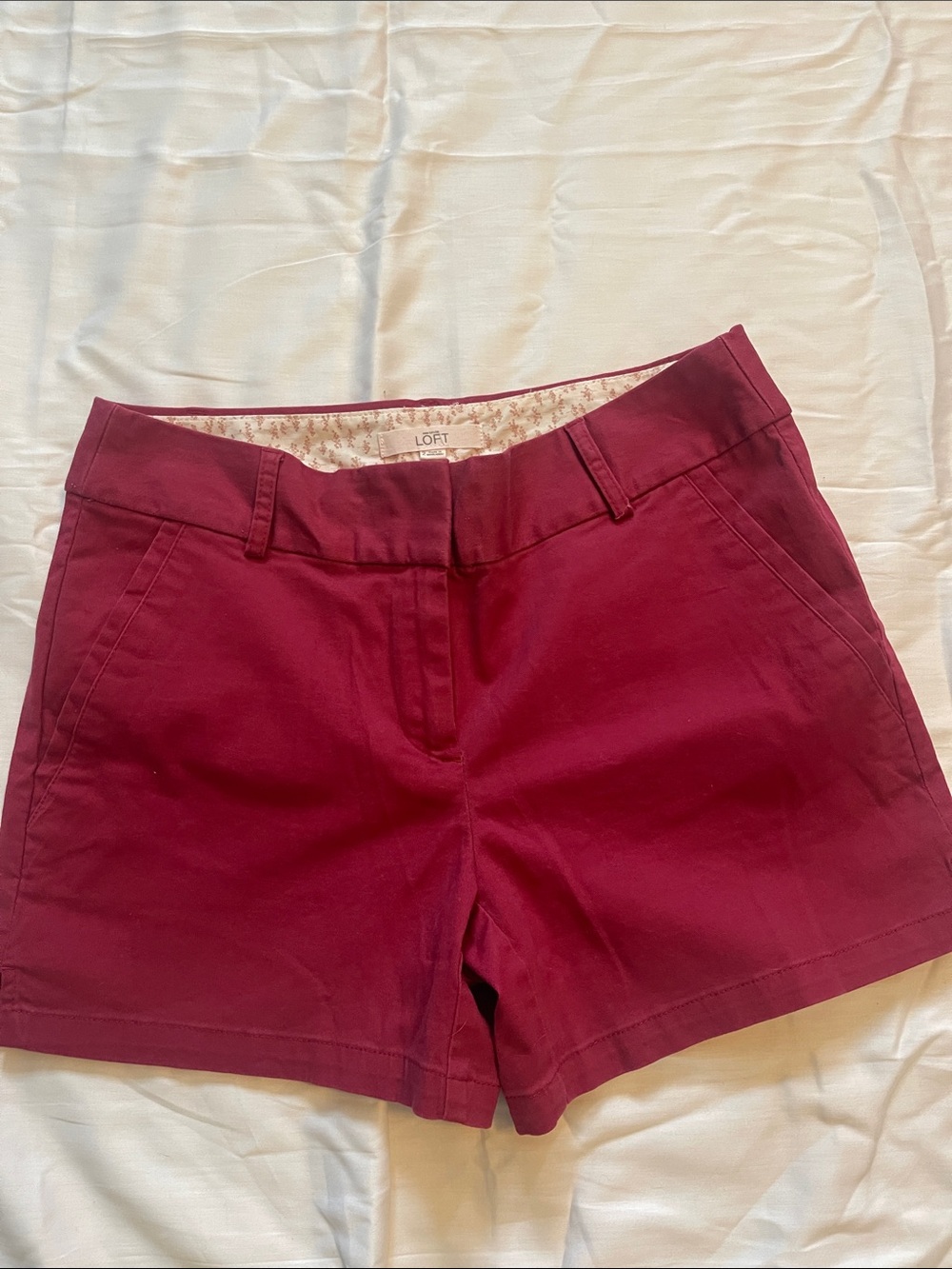 LOFT Women's berry Red Stretch chino shorts.